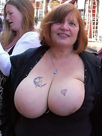 Hot mature shows a huge bobbs in public